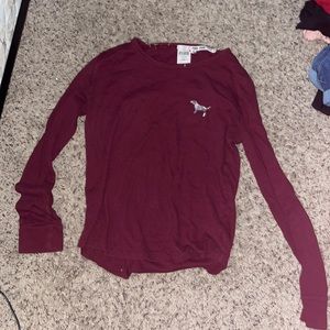 Pink long sleeved t shirt.